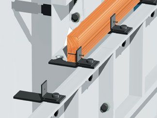 Illustration of saddle brackets installed on wall forms, carrying a timber ledge